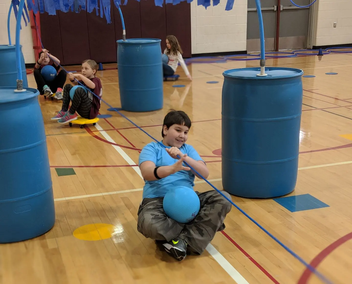 Germantown student completing obstacle course with Heart Zones