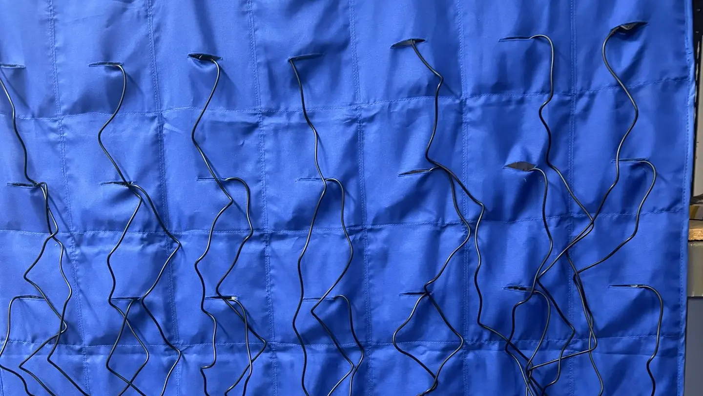 Charging cords organized in Hanging Charging Station