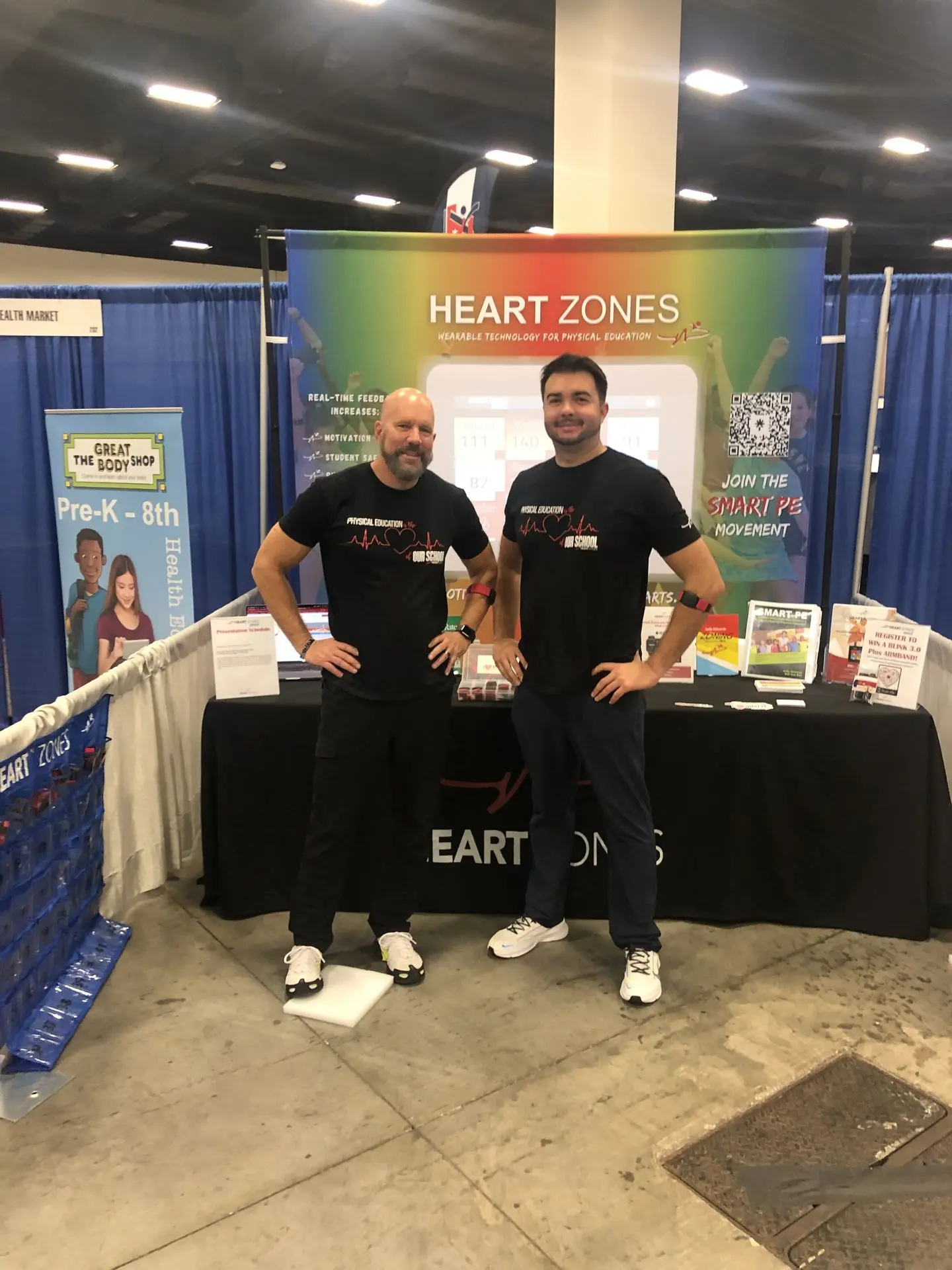 Joe & Will at a Heart Zones' conference booth